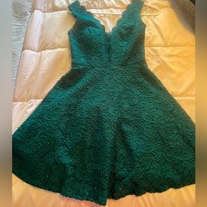 mid length forest green dress with shimmer